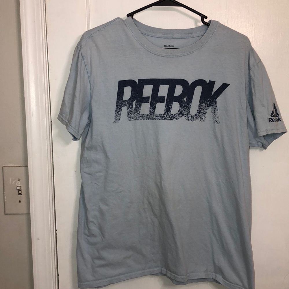Blue reebok shirt